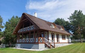 Greyówka dom kryty strzechą w Gardna Park